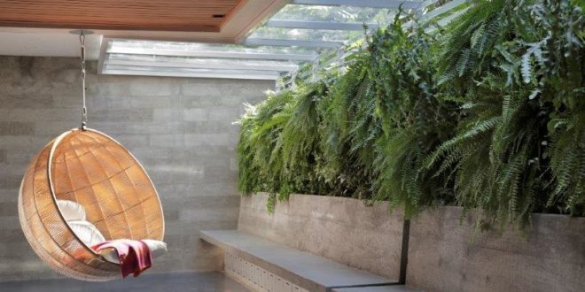 Idealizado pelo escritório carioca PKB Arquitetura, apartamento localizado no Jardim Botânico integra a natureza ao morar